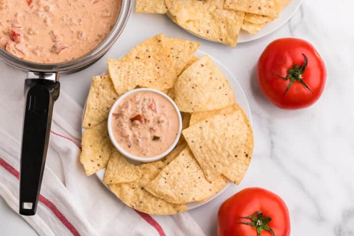 top-down view of the sausage cream cheese dip with tortilla chips.