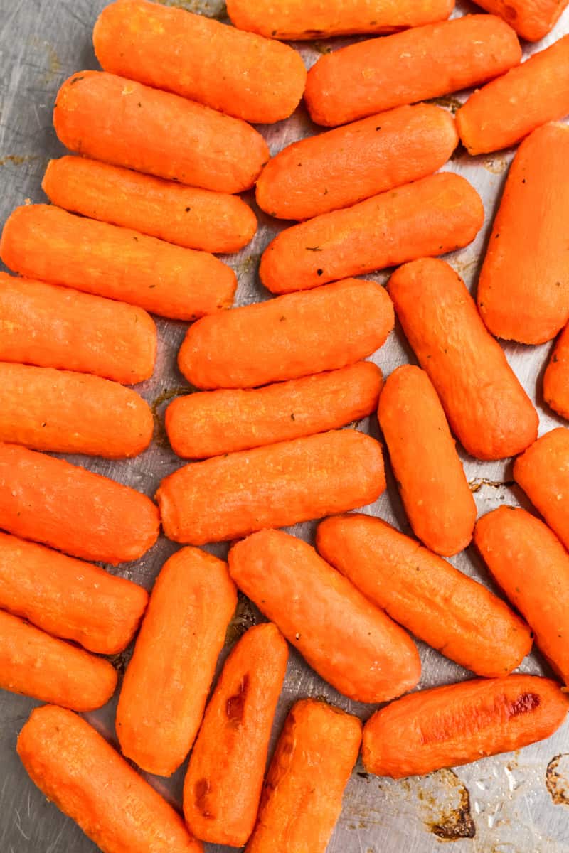 closeup of the carrots on the baking sheet.