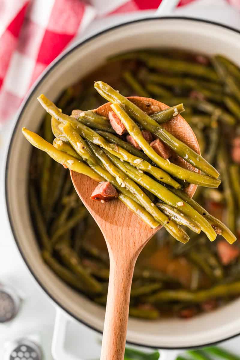 serving the Southern Green Beans out of the stock pot.