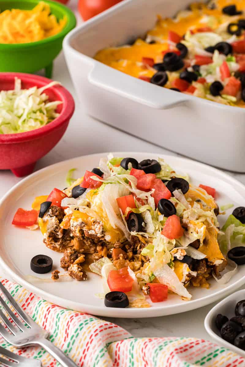 taco casserole served on a white plate.