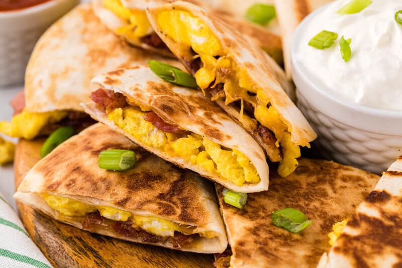 Closeup of the Breakfast Quesadillas with sour cream.