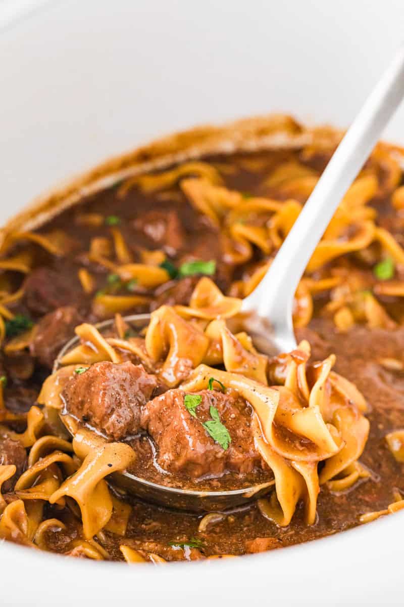 closeup of the beef and noodles in the slow cooker.
