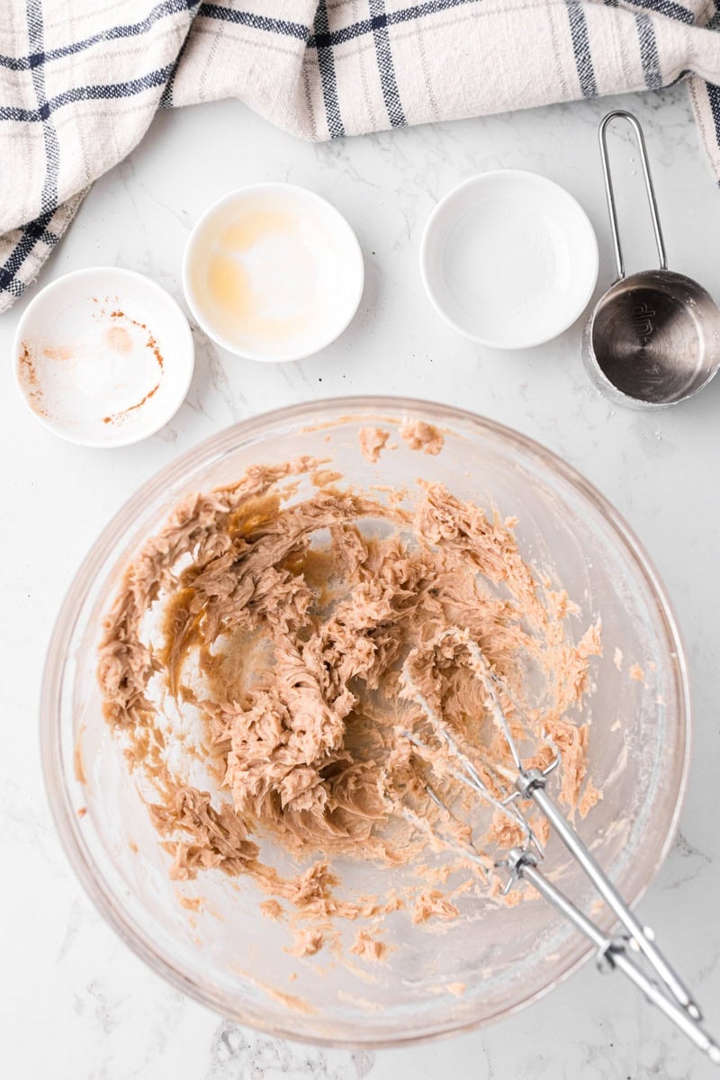 mixing the butter together with a hand mixer.