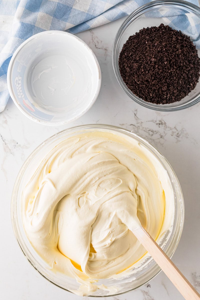 top-down view of mixing the cool whip and pudding together.