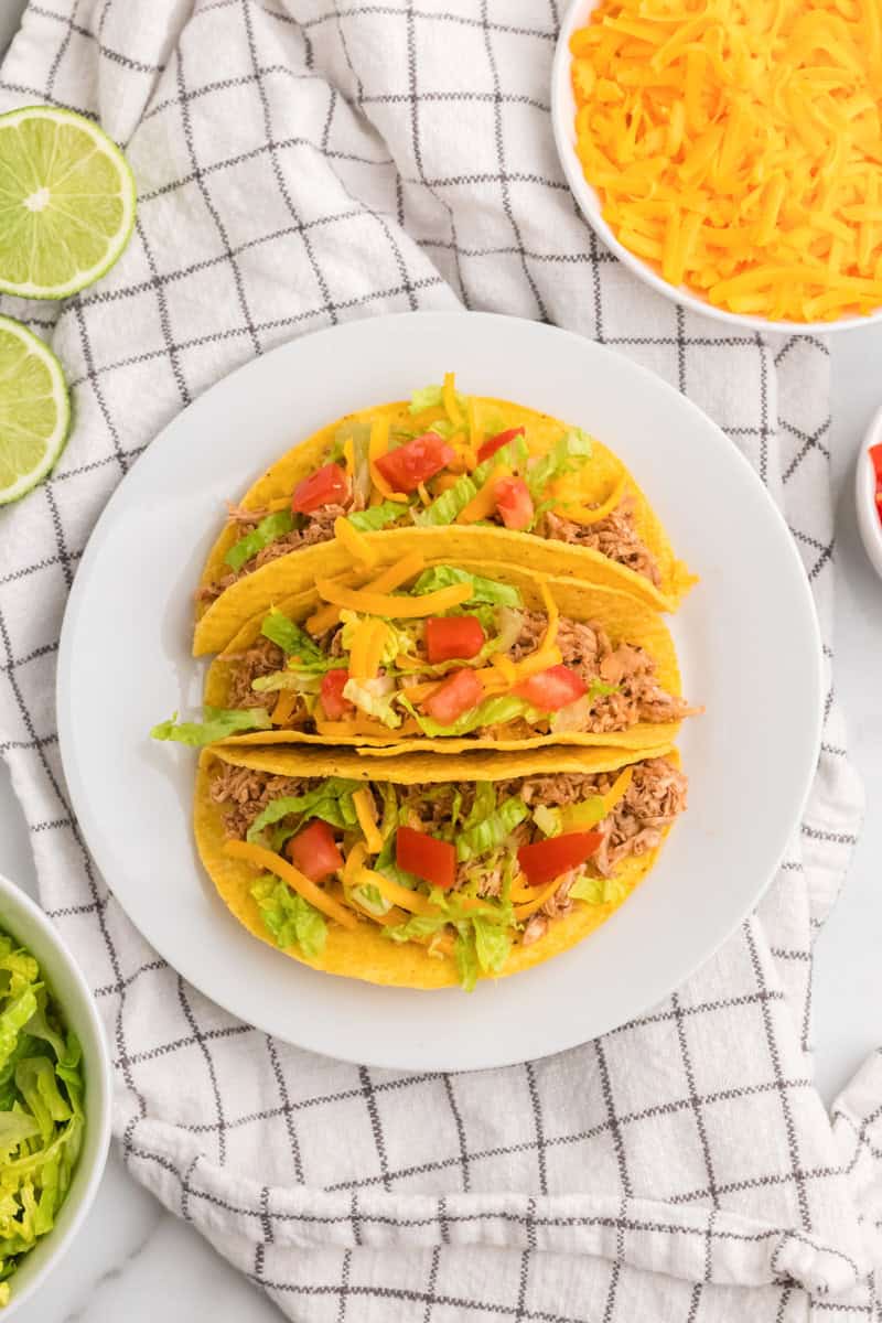 top-down view of 3 of the rotisserie chicken tacos.