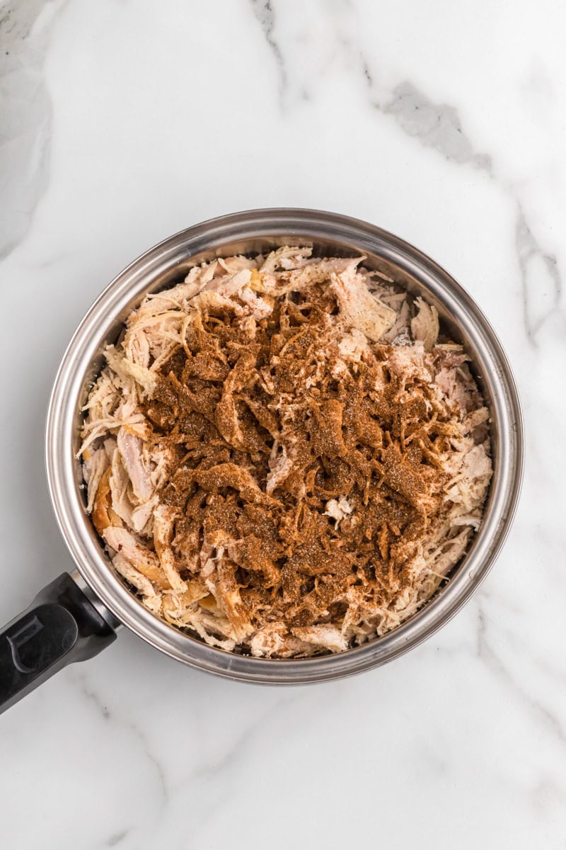 seasoning and chicken in a small pot.