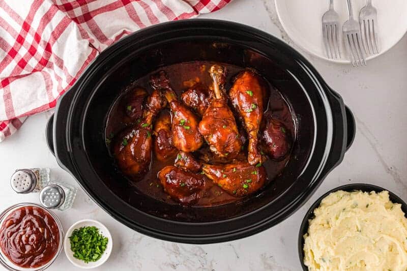top-down view of the slow cooker BBQ Chicken Drumsticks.