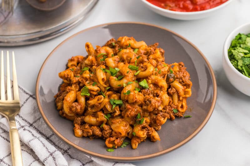One Pan Taco Pasta served on a grey plate.