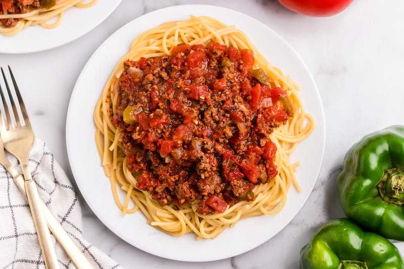 Homemade Spaghetti Sauce on a bed of spaghetti.