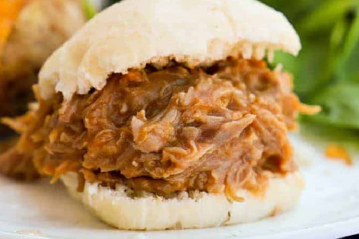 closeup of a Slow Cooker Pulled Pork sandwich.