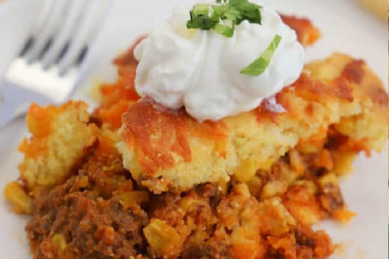 closeup of the Taco Cornbread Casserole on a white plate.