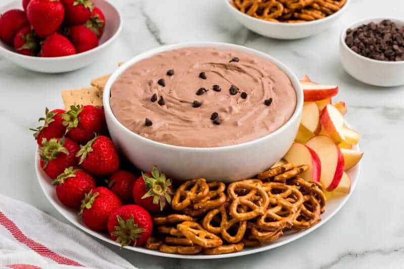 Brownie Batter Dip served with fruit, crackers and pretzels.