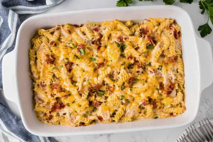 Chicken Bacon Ranch Casserole baked in a white baking dish.