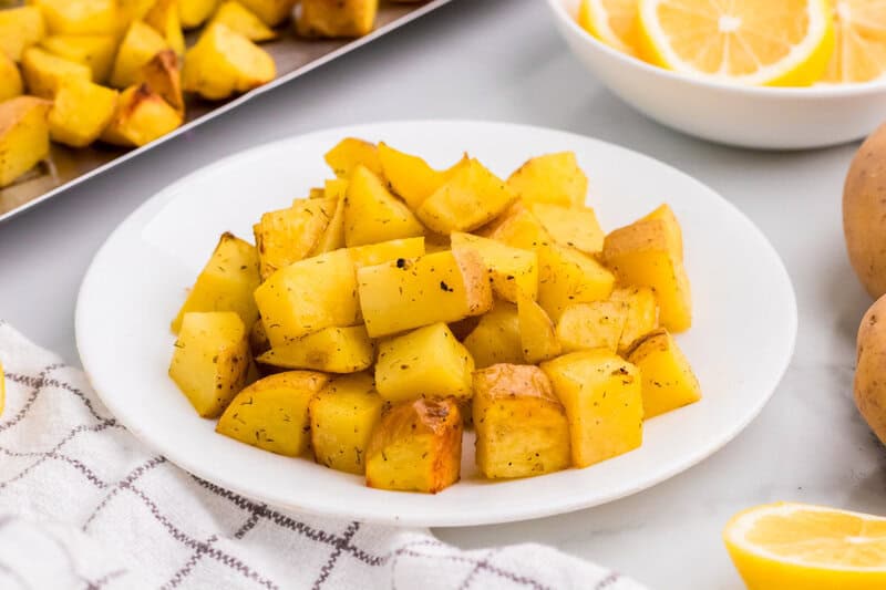 Lemon Herb Roasted Potatoes served on a white plate.