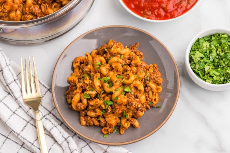 top-down view of the One Pan Taco Pasta served on a grey plate.