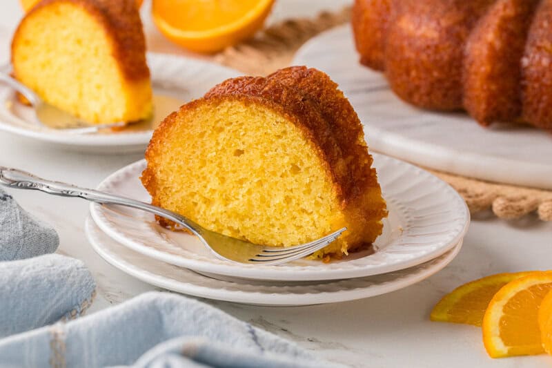 slice of the Orange Juice Cake served on a white plate.