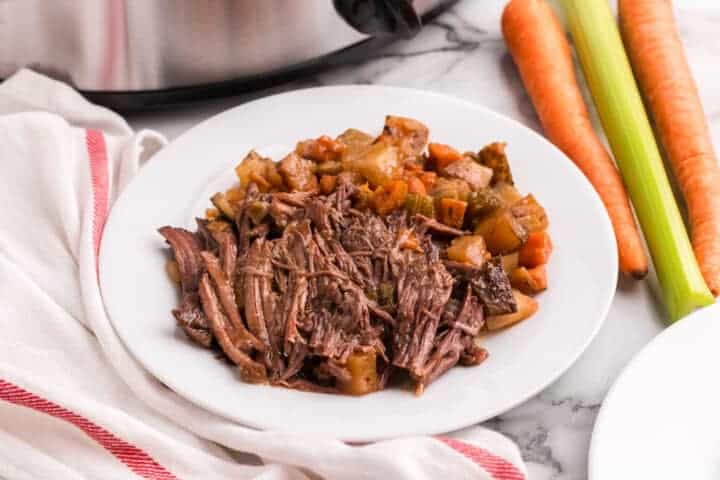 Slow Cooker Pot Roast served on a white plate.