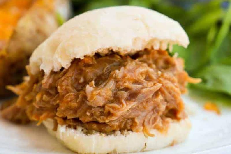 closeup of the Slow Cooker Pulled Pork Sliders.