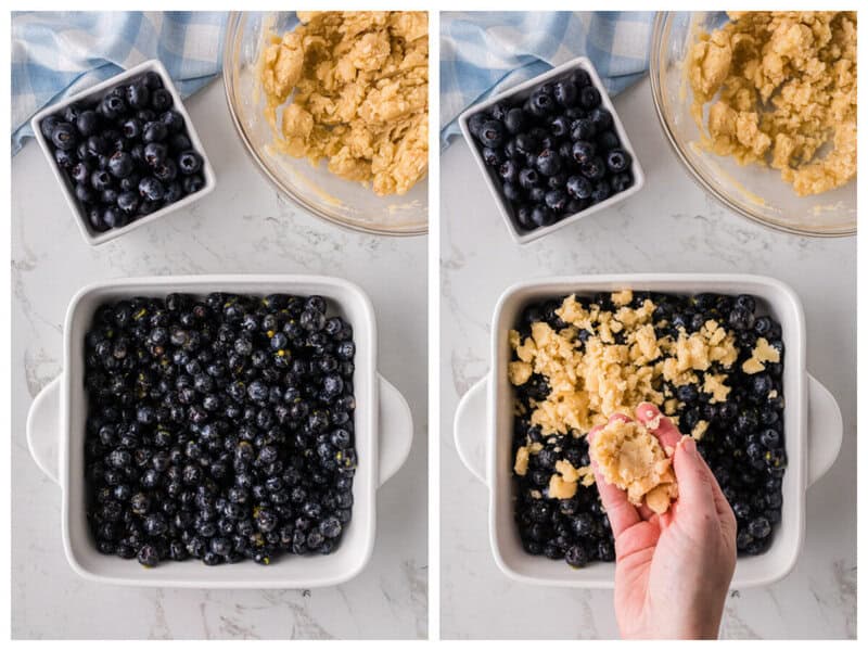 the blueberries in the baking dish being topped with the cobbler crumb topping.