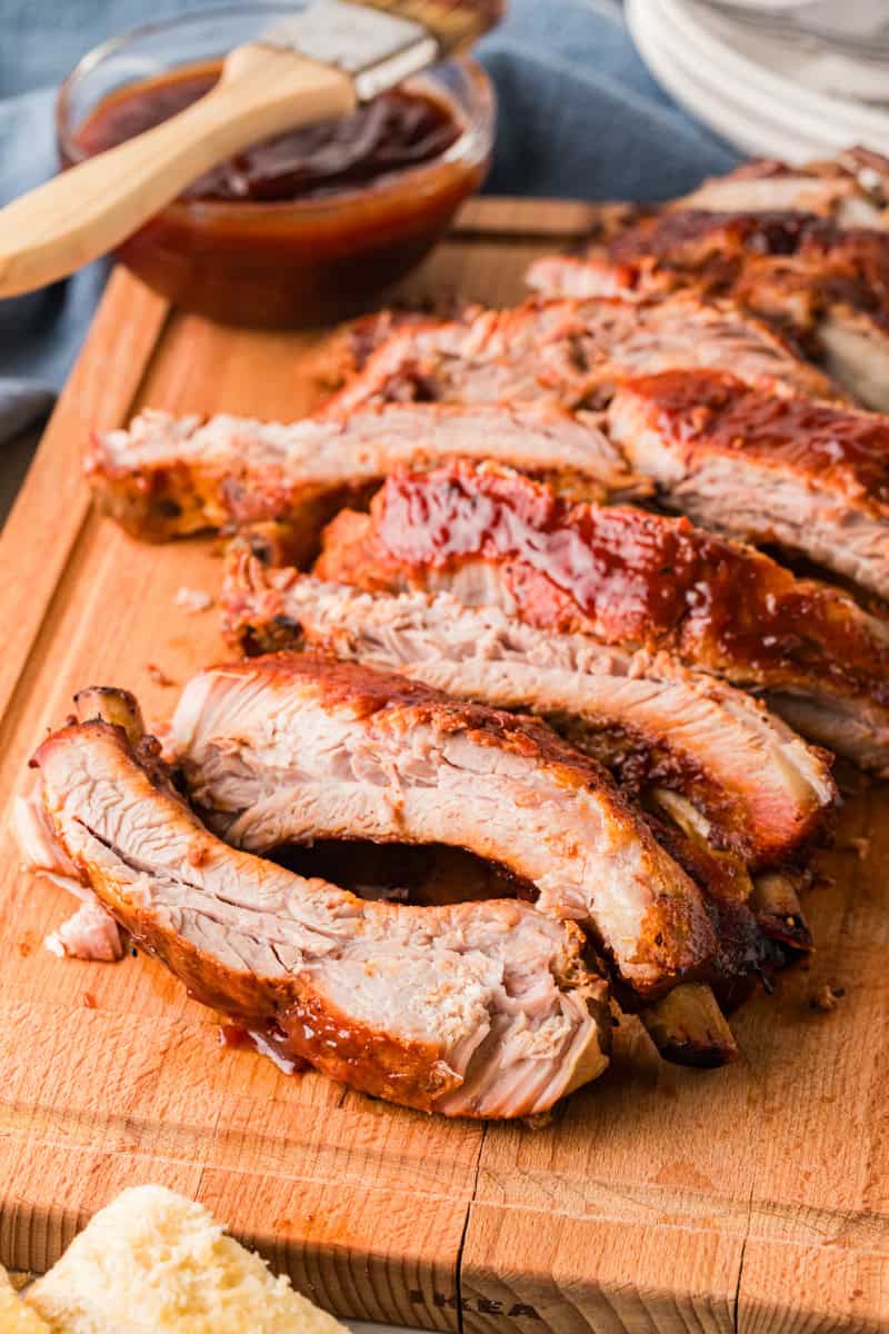 Crockpot Ribs Served on a wooden board.