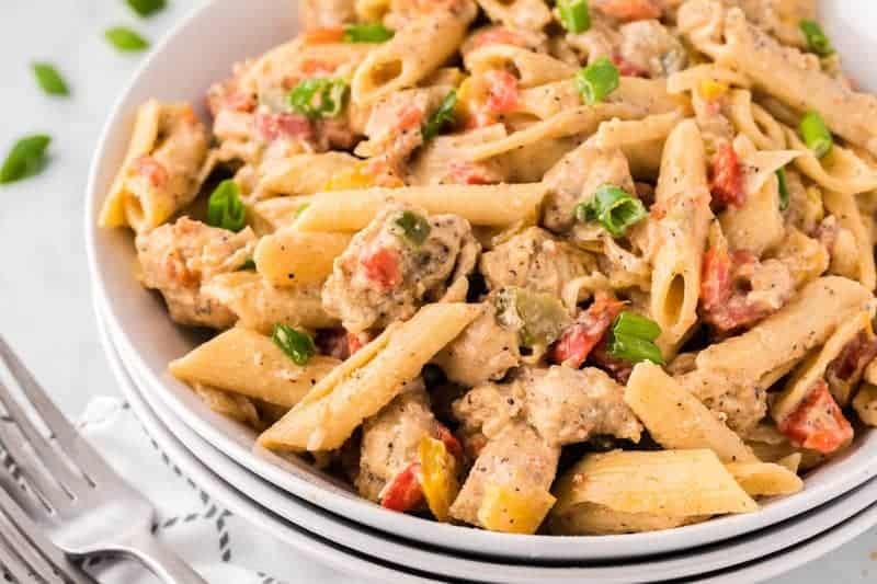 Chicken Fajita Pasta served on white plates.
