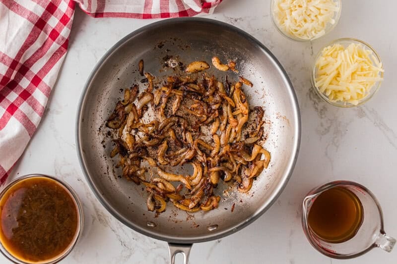 cooking the onions in the skillet.