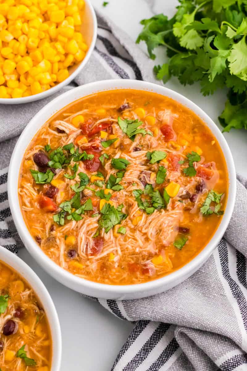 top-down view of the Slow Cooker Chicken Taco Soup served in a white bowl.