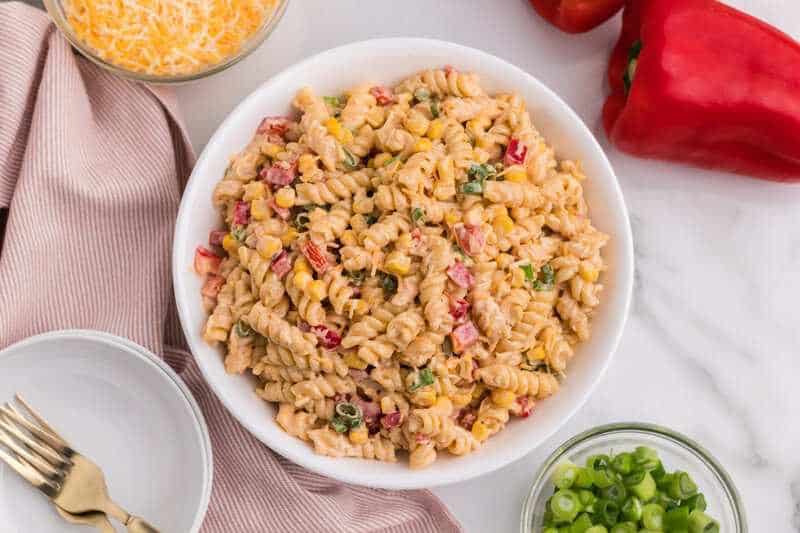 Taco pasta salad served in a white bowl.