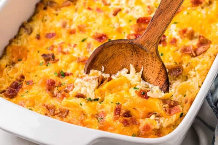 Crack potatoes with bacon cheese and ranch in a casserole dish.