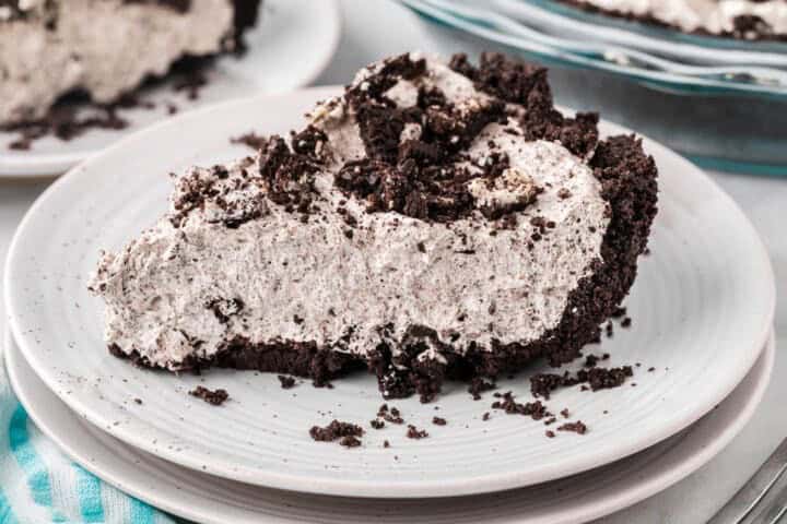 slice of Oreo Pie served on a white plate.