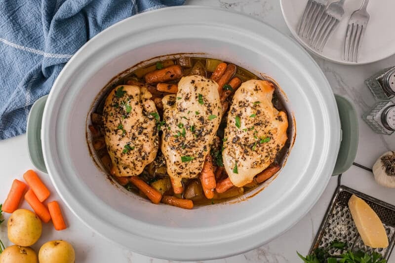 top-down view of the Chicken and Potatoes in the slow cooker.