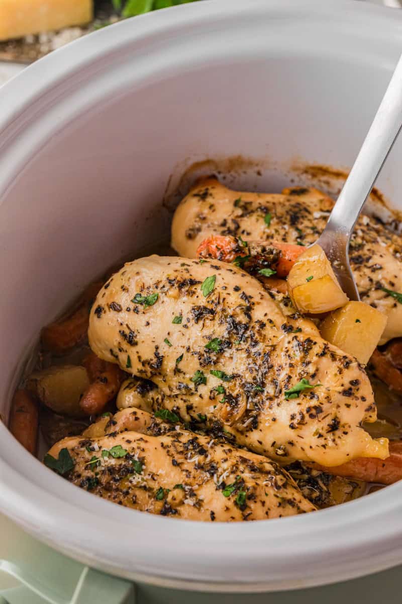 serving the chicken and potatoes out of the slow cooker.