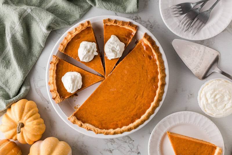 top-down view of the Pumpkin Pie sliced in the pie tin.