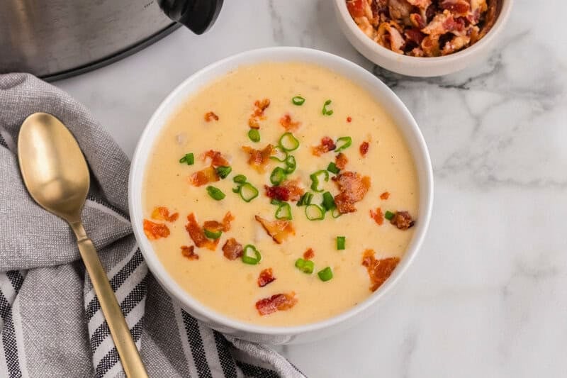 top-down view of a bowl of the Cheesy Potato Soup.
