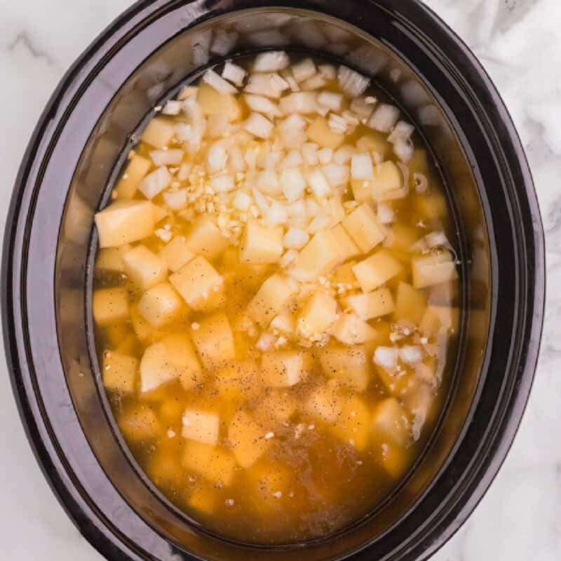 potatoes, onions and brother in the slow cooker.