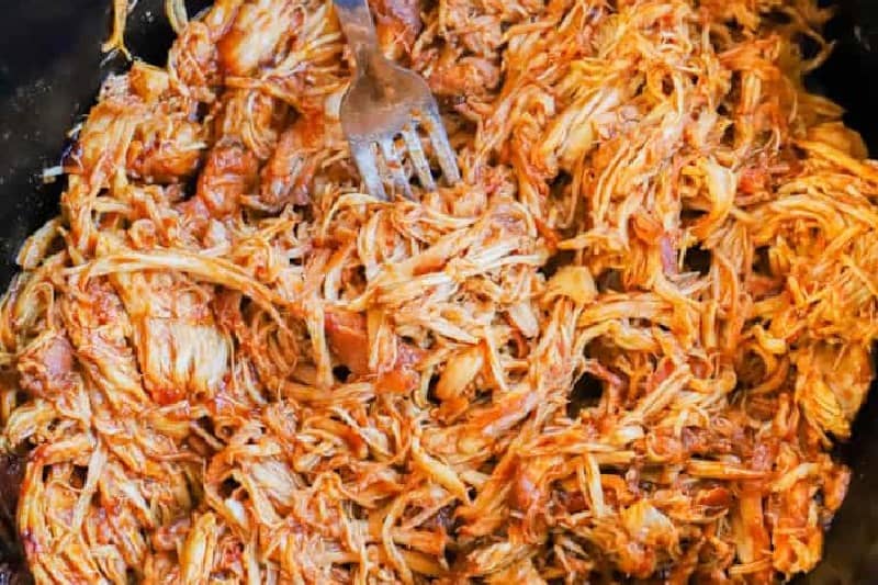 closeup of the Slow Cooker BBQ Chicken in the slow cooker.