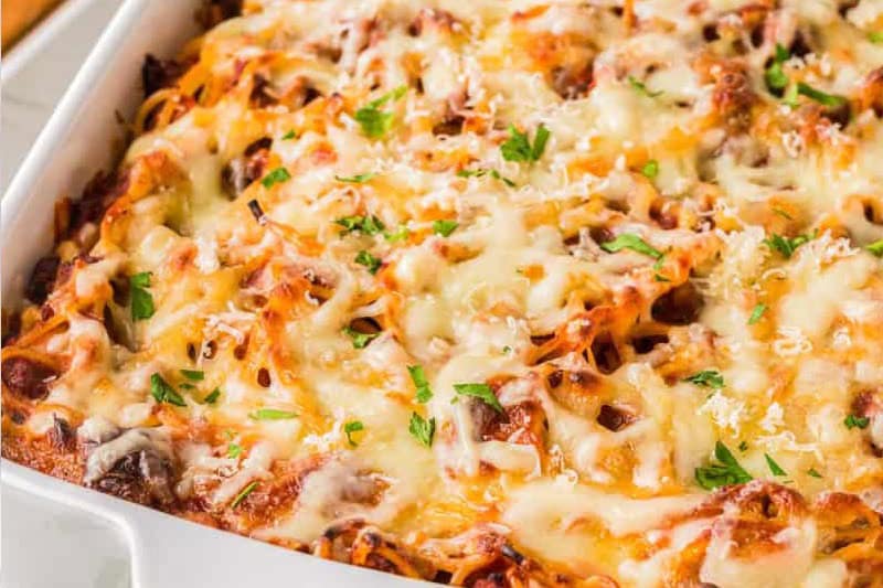 closeup of the Million Dollar Spaghetti in a white baking dish.