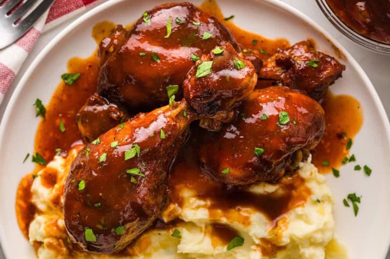 top-down view of the BBQ Chicken Legs served on mashed potatoes.