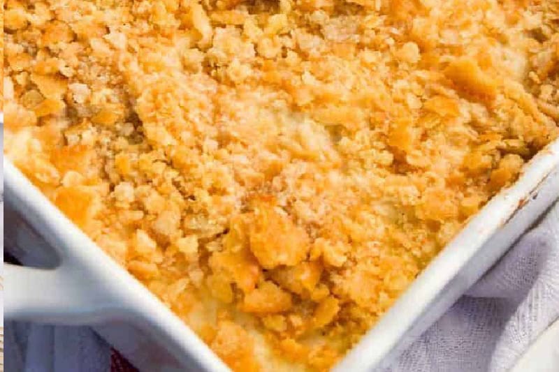 closeup of the Ritz Cracker Chicken Casserole in a white baking dish.