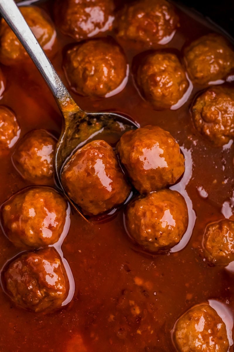 closeup of the meatballs in the slow cooker.