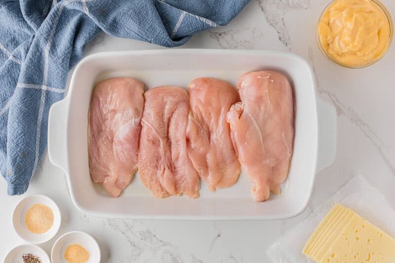 chicken breasts in the bottom of the baking dish.