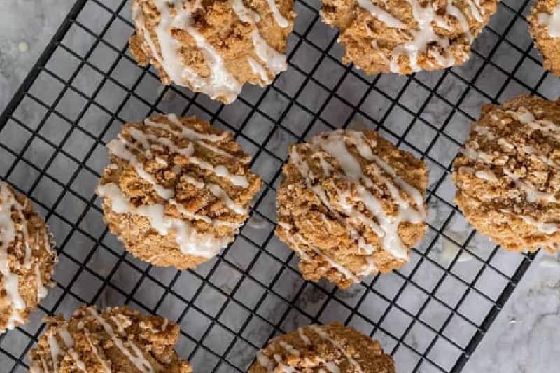 Coffee Cake Muffins on a cool rack.