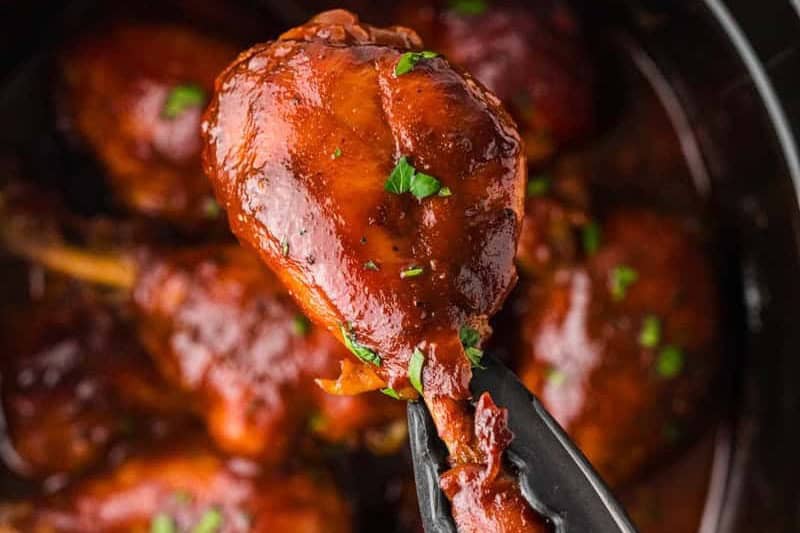 serving the BBQ Chicken Legs out of the Slow Cooker.