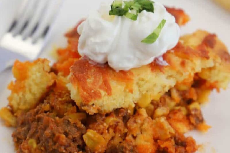 closeup of the Cornbread Taco Pie served on the white plate.