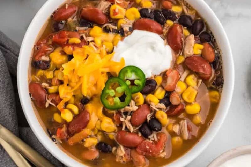 top-down view of the 7 Can Taco Soup served in a white bowl.