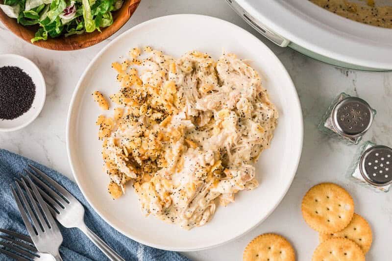 top-down view of the Slow Cooker Poppyseed Chicken Casserole served on a white plate.