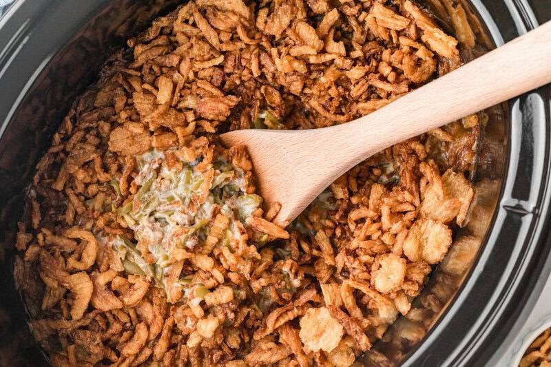 serving the Slow Cooker Green Bean Casserole out of the slow cooker.