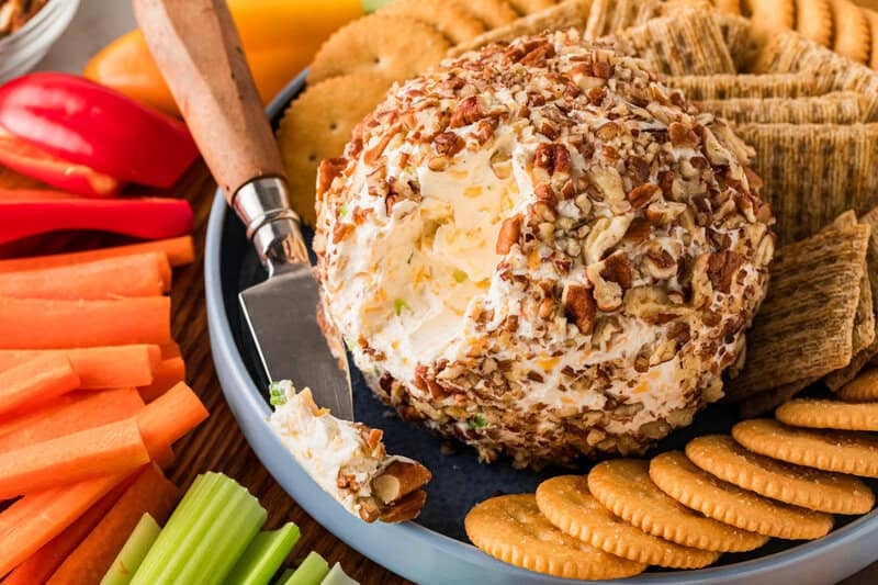 closeup of the Cheese Ball served with veggies and crackers.