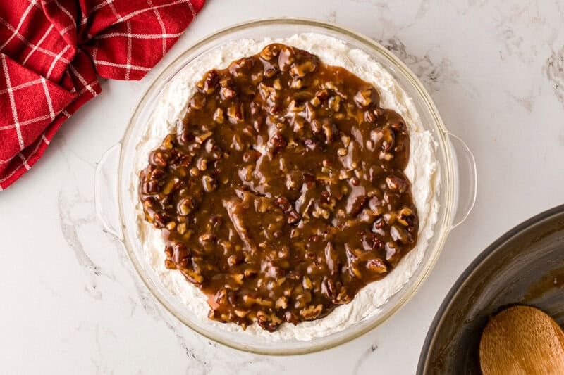 finished Pecan Pie Dip served in a glass dish.